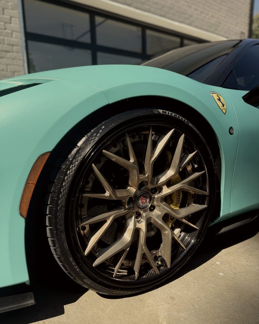 Bronze forged wheel and yellow caliper on a Ferrari F8 Tributo