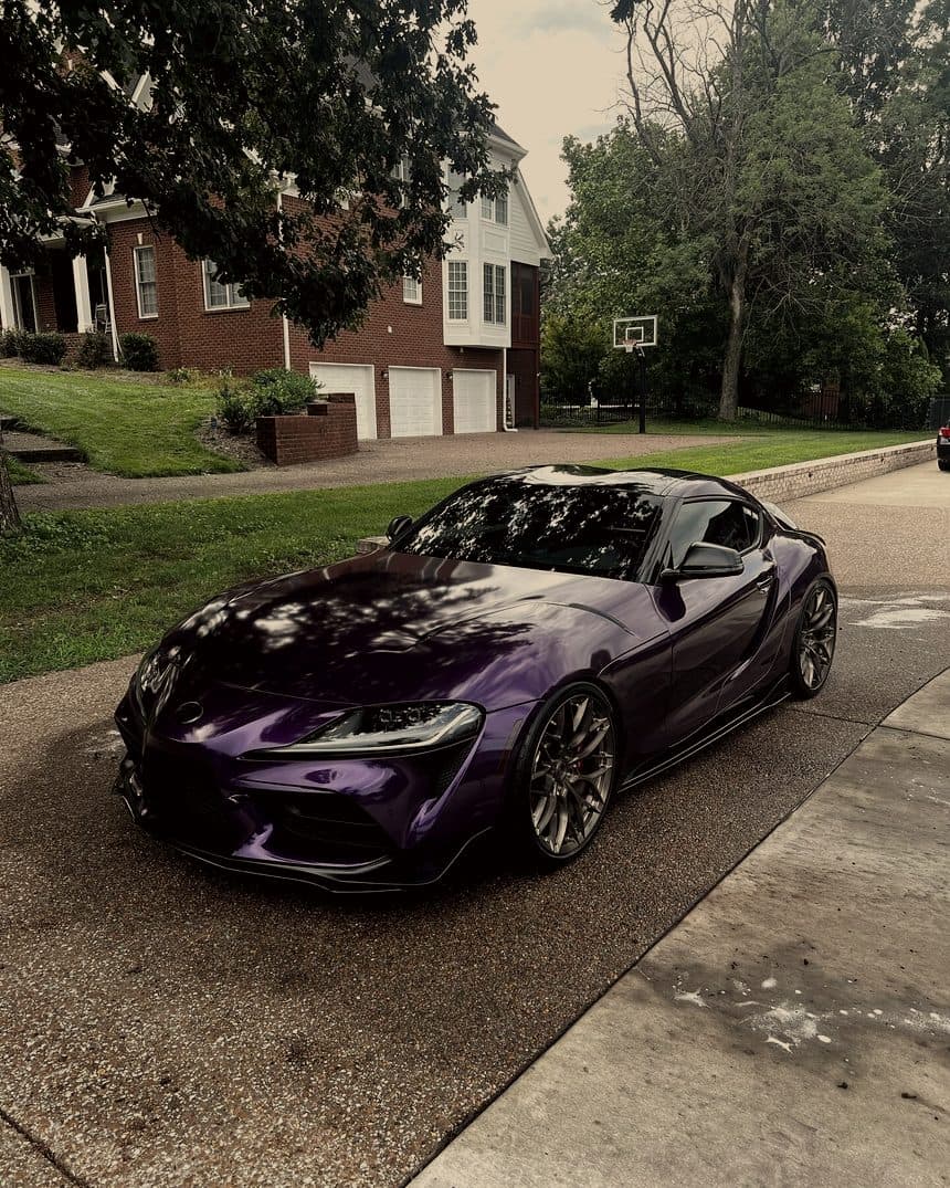 Purple chrome Toyota Supra parked on a driveway